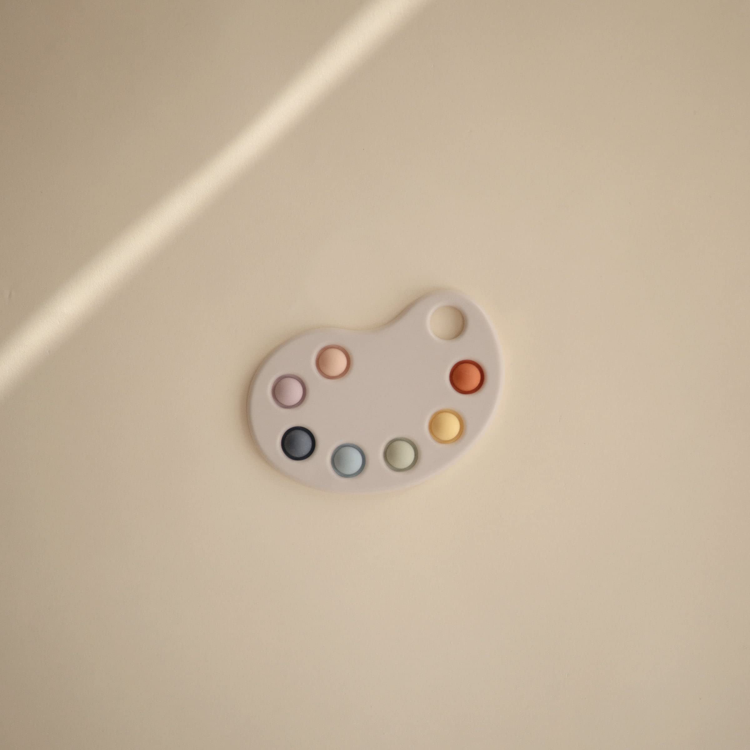 Mushie Paint Palette Press Toy | Sensory Fidget for Babies 10+ Months